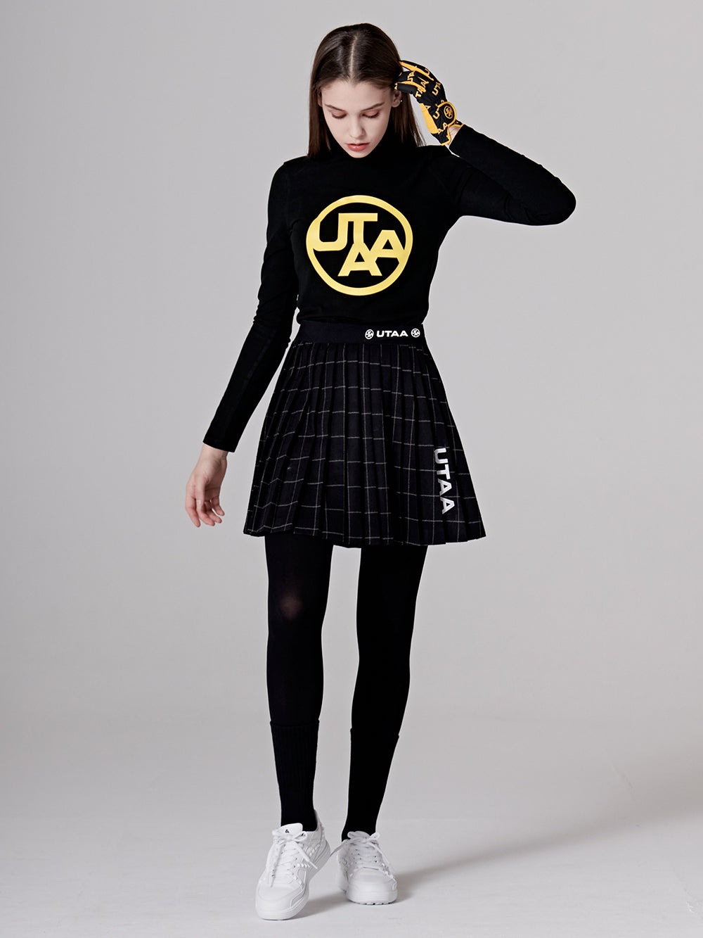 UTAA ミッドエンブレムスイングフィットスリーブ (女性用)