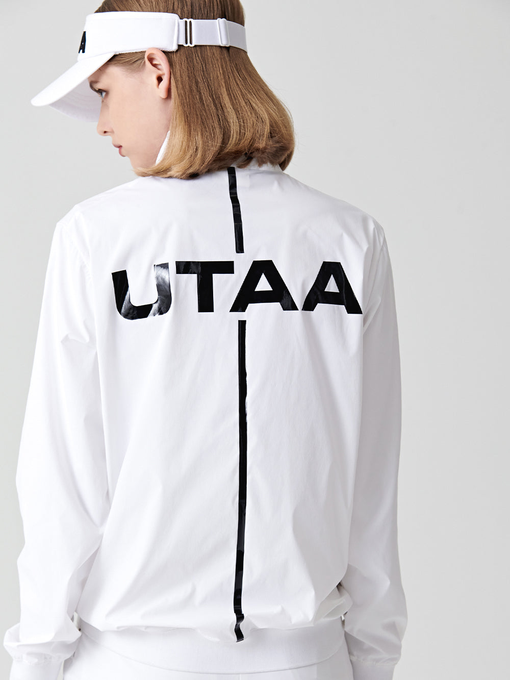 ユタ テープロゴハーフジップアップウィンドブレーカー (女性用)