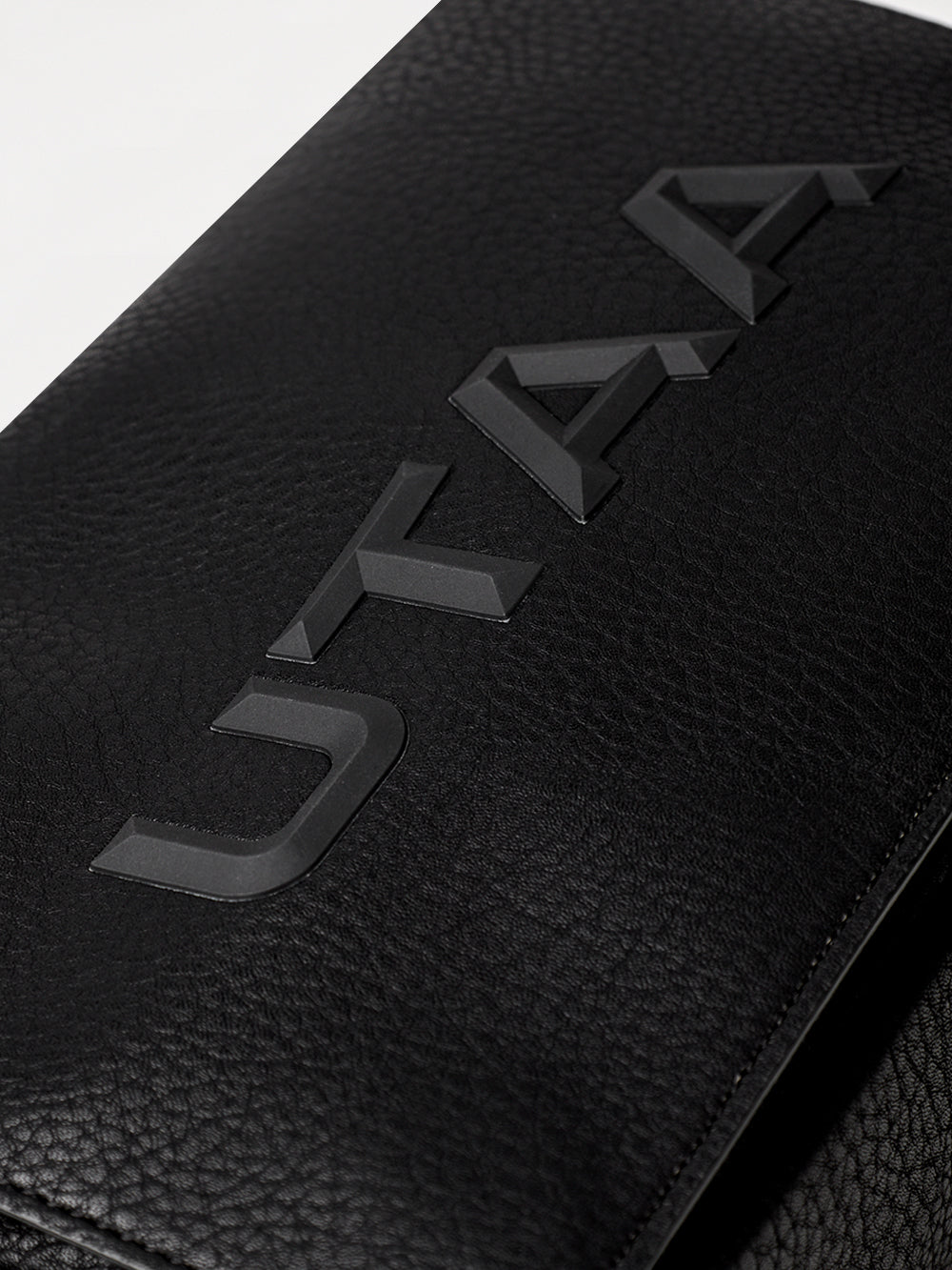 ユタ フィギュアロゴストラップポーチバッグ