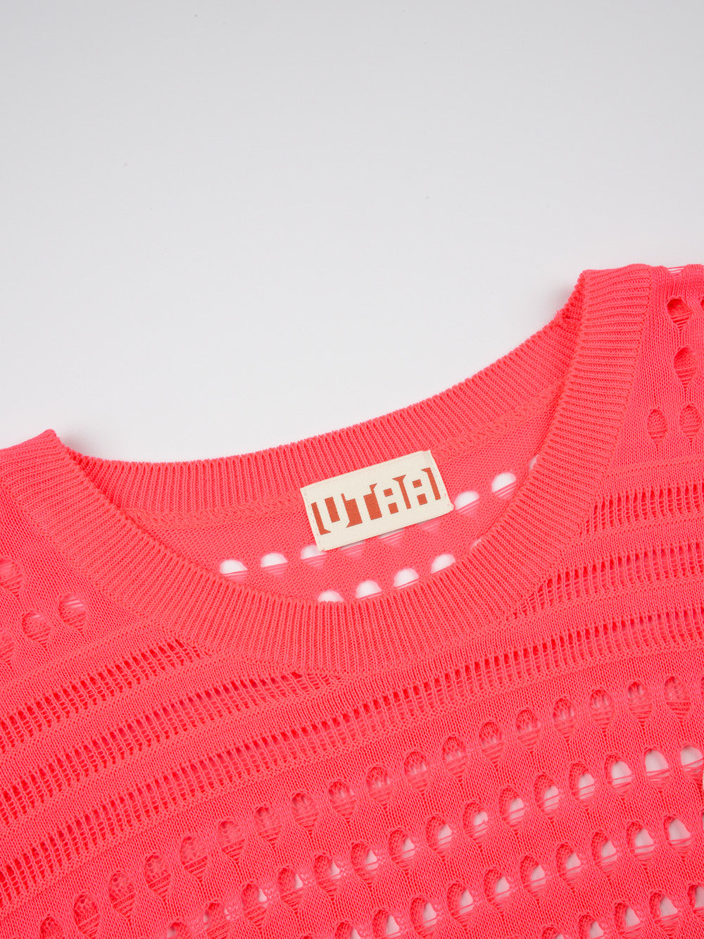 UTAA パンチングScasiニットベスト : Women's