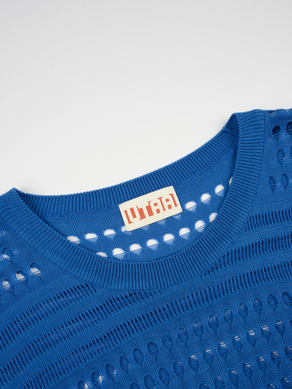 UTAA パンチングScasiニットベスト : Women's