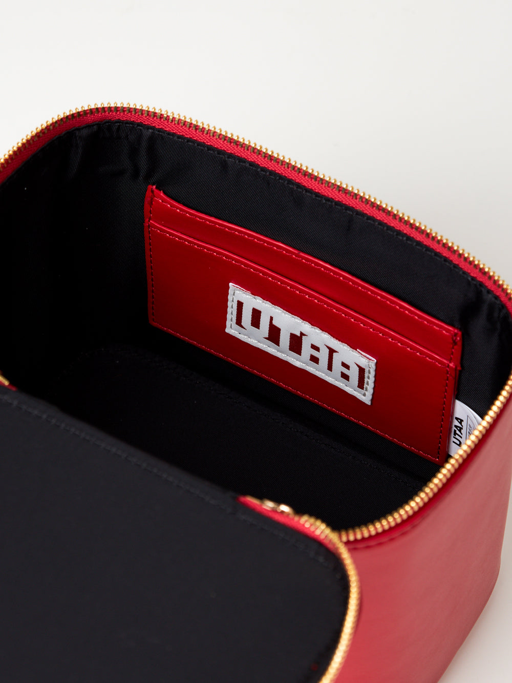 UTAA モルトカラーシェードエンボスミニトッドバッグ