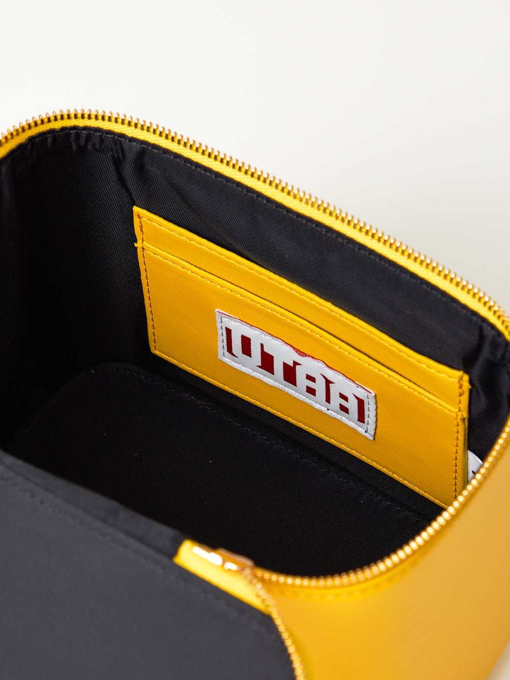 UTAA モルトカラーシェードエンボスミニトッドバッグ イエロー