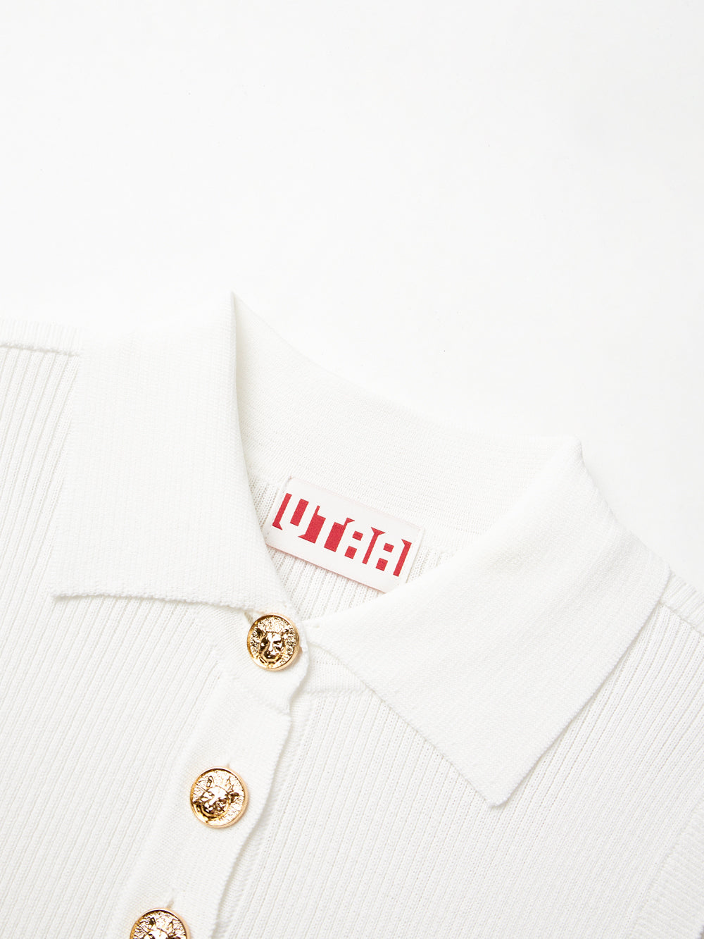 UTAA ドュカットゴールドシンボルニットスリーブネス ホワイト : Women's