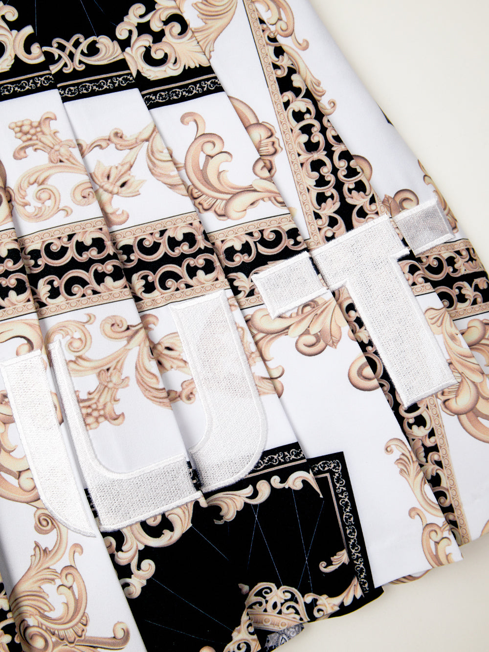 ユタ カラーパールバロックプリーツスカート