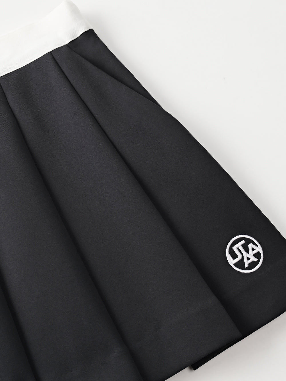 ユタ レタリングテープポケットプリーツスカート