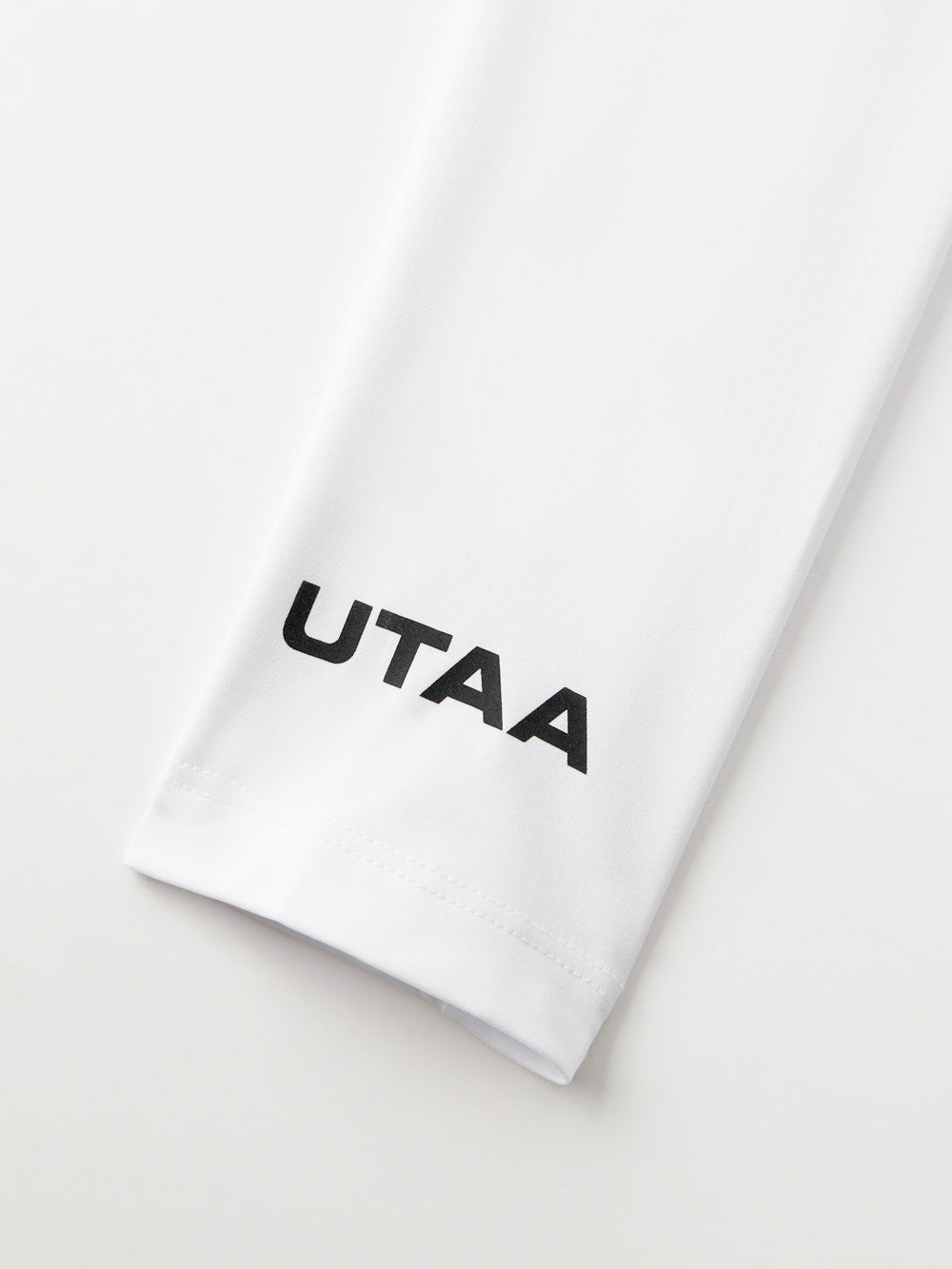 UTAA モノラルビンディングPKスリーブ (女性用) ホワイト