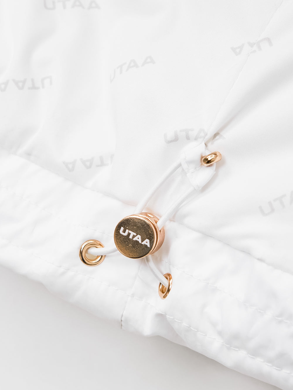 UTAA ゴールドストリングロングダウンジャンパー ホワイト : Women's