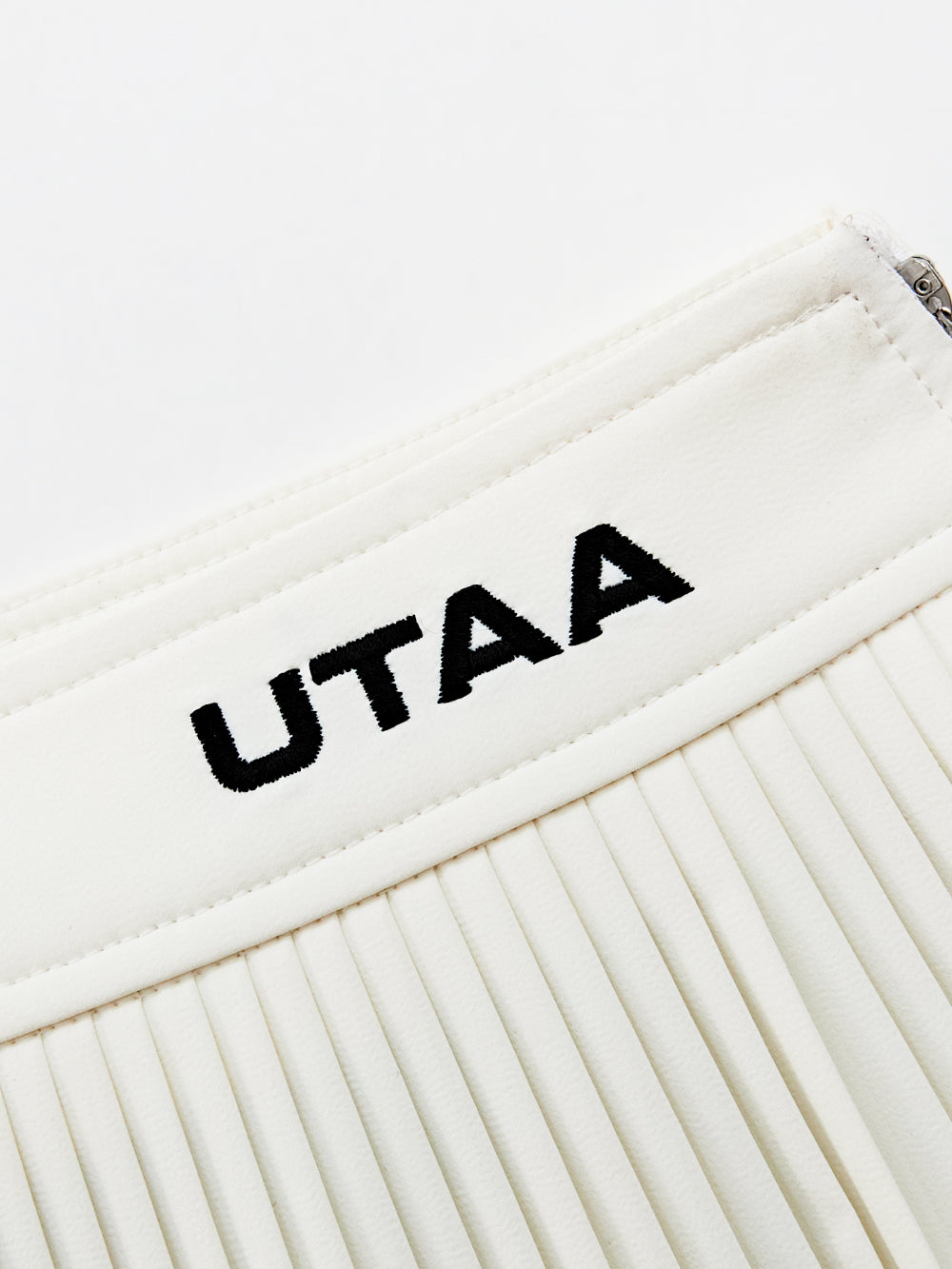 ユタ カーブリングプリーツスカート