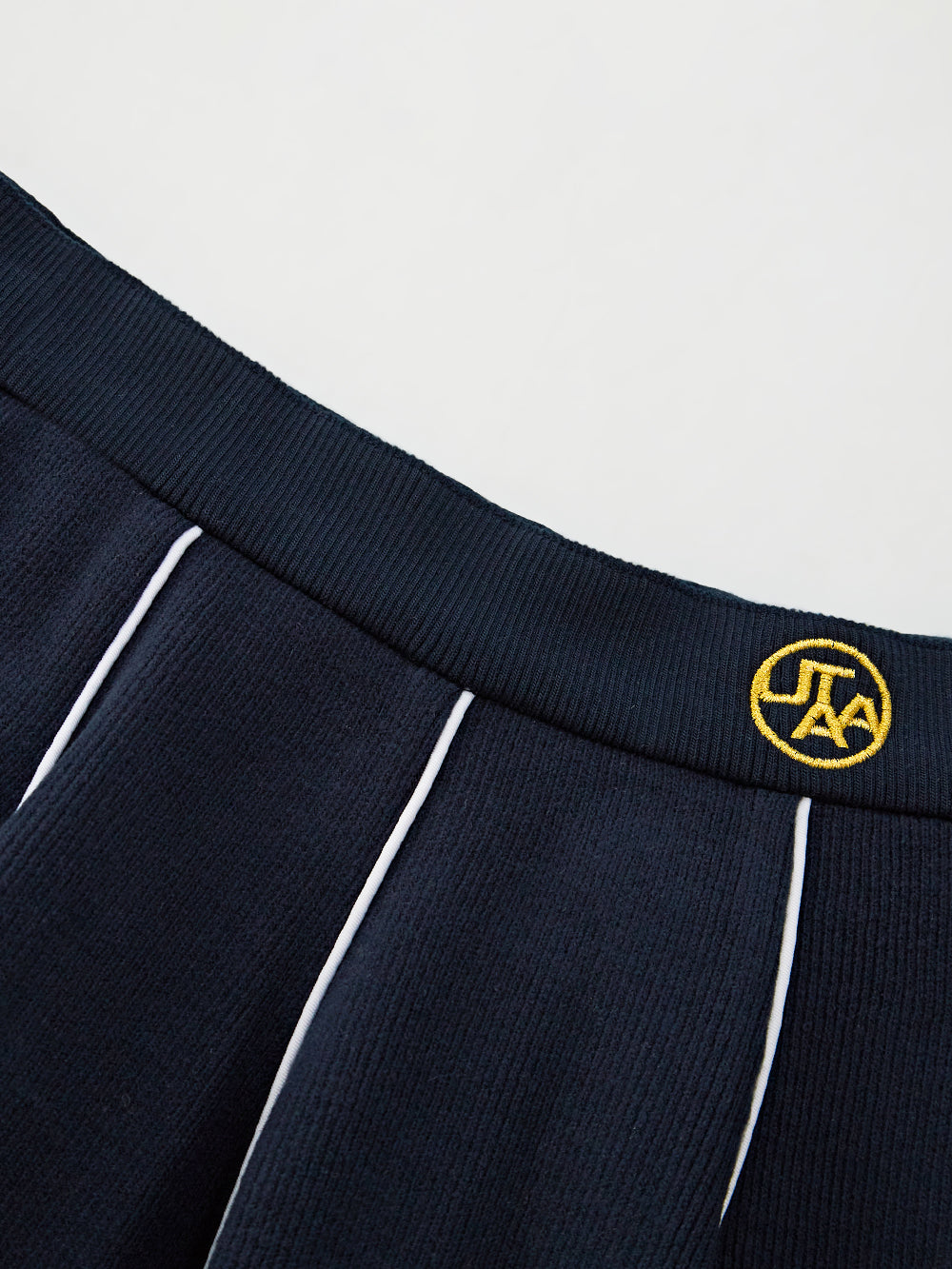 ユタ ゴルドシンボルストリングフレアスカート