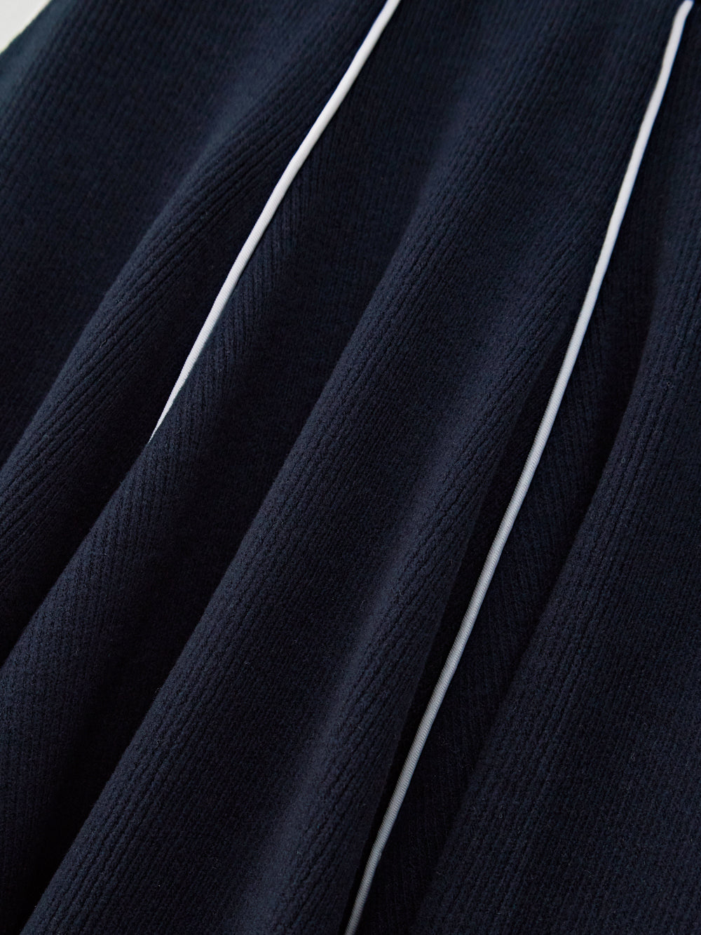 ユタ ゴルドシンボルストリングフレアスカート