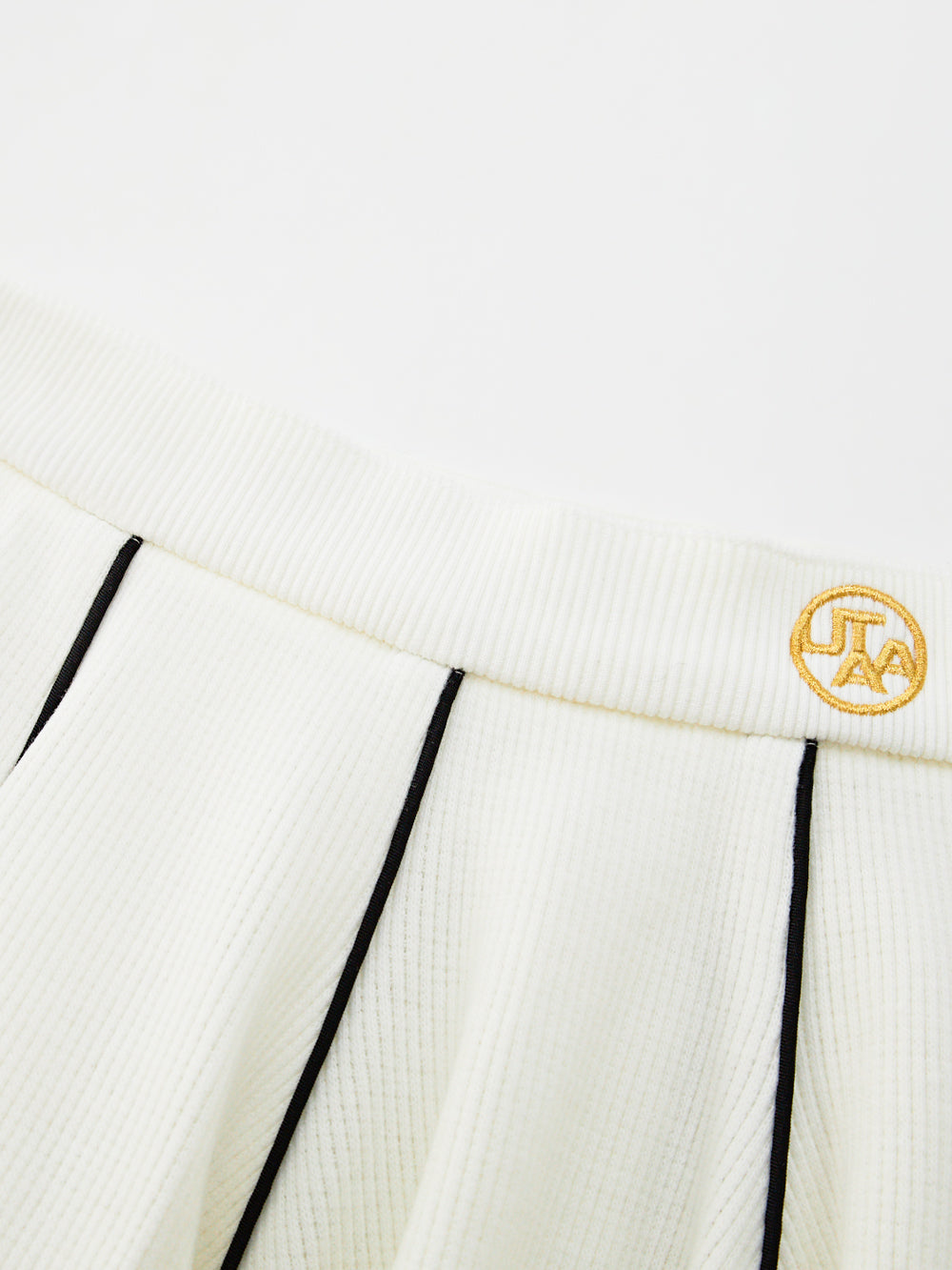 ユタ ゴルドシンボルストリングフレアスカート