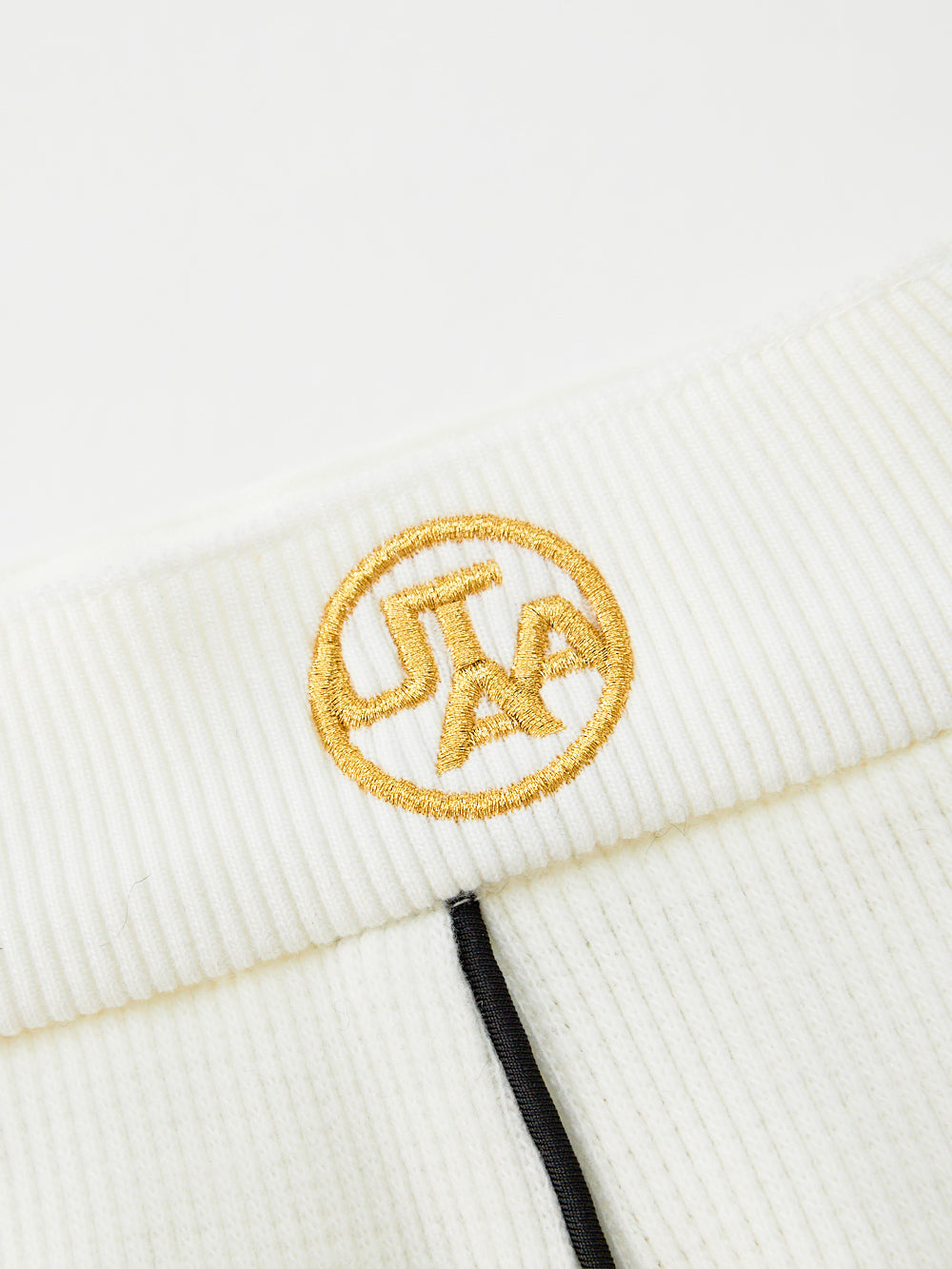 ユタ ゴルドシンボルストリングフレアスカート