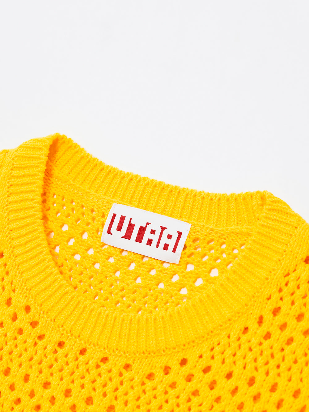 UTAA クロシェパンチングMotifスリーブレスニット イエロー : Women's