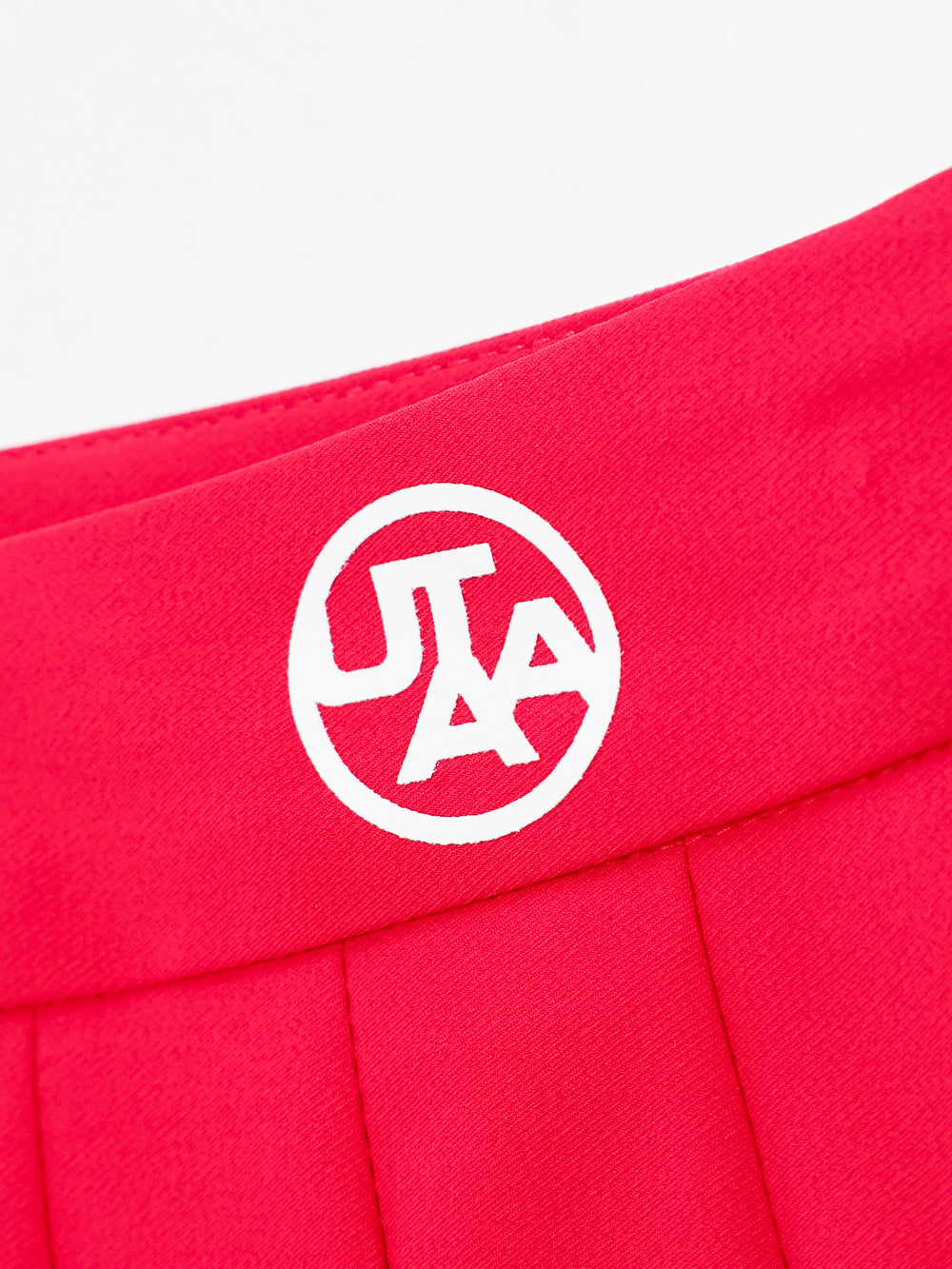 ユタ チェリッシュボールドロゴプリーツスカート