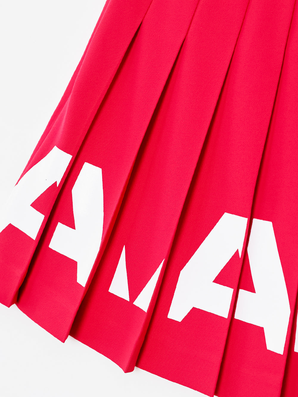 ユタ チェリッシュボールドロゴプリーツスカート