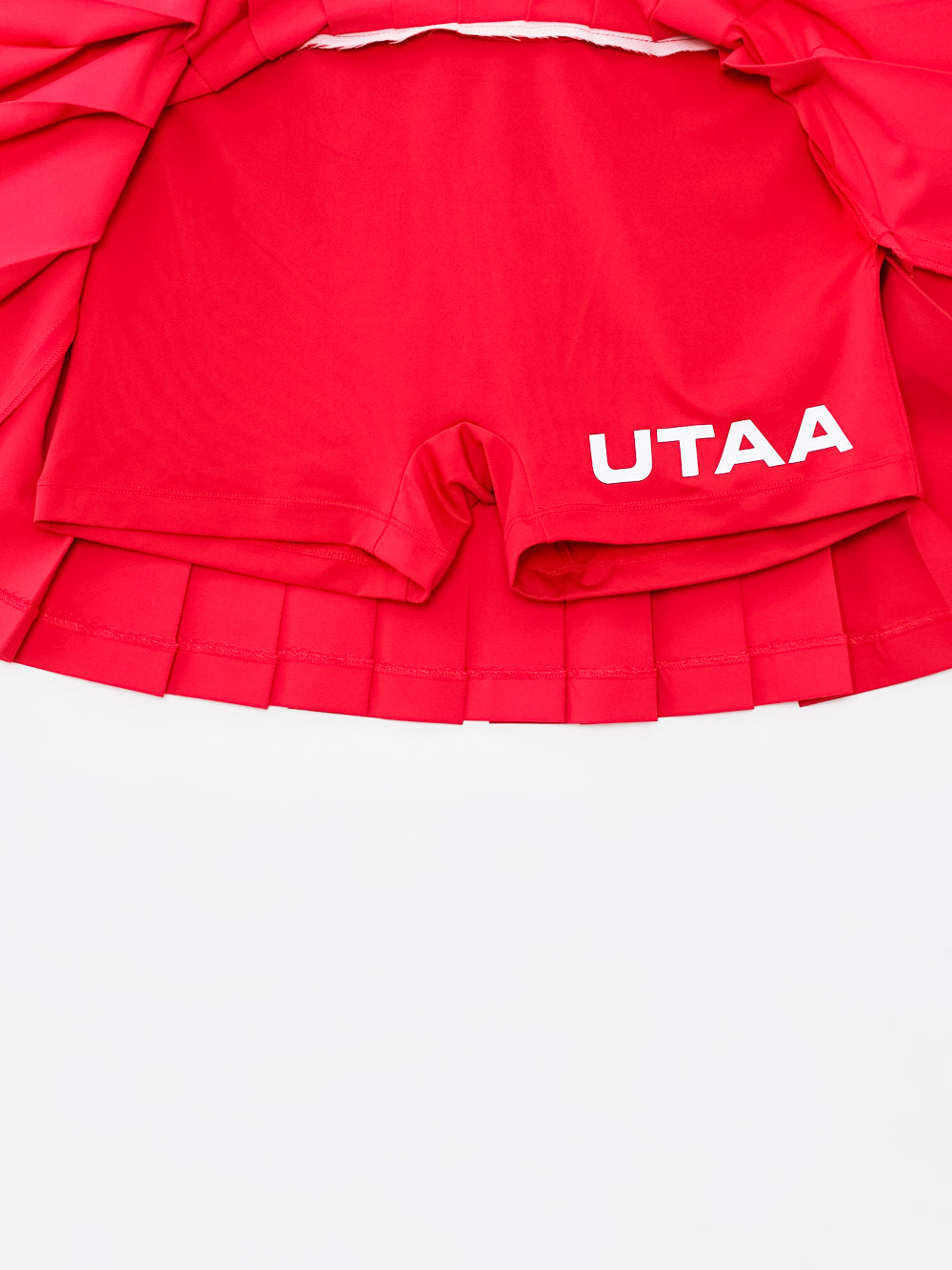 ユタ チェリッシュボールドロゴプリーツスカート