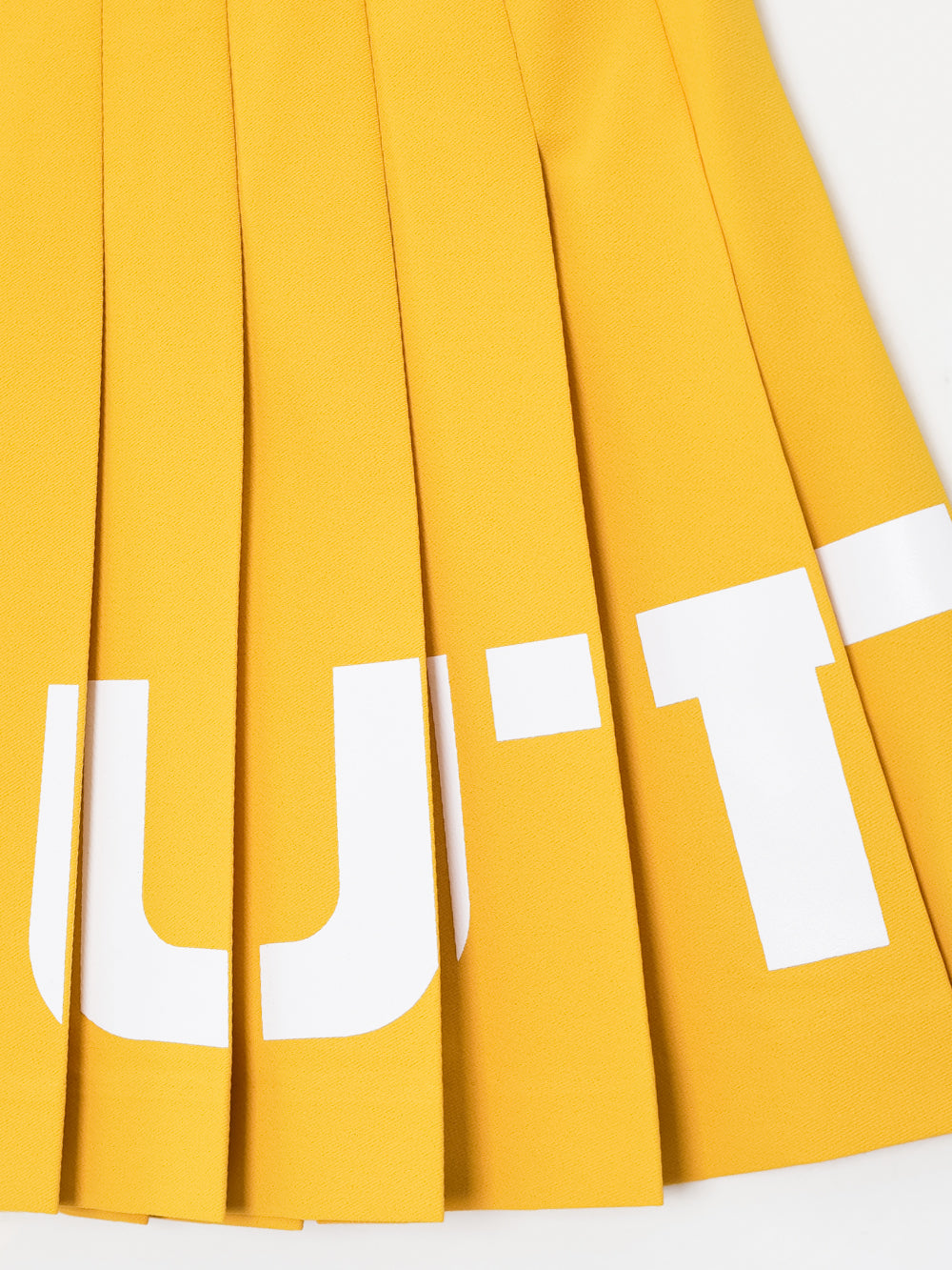 ユタ チェリッシュボールドロゴプリーツスカート