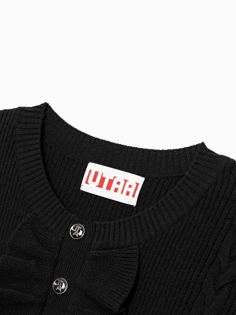 ラッフルレイヤーパンチングラインスリーブレスニット