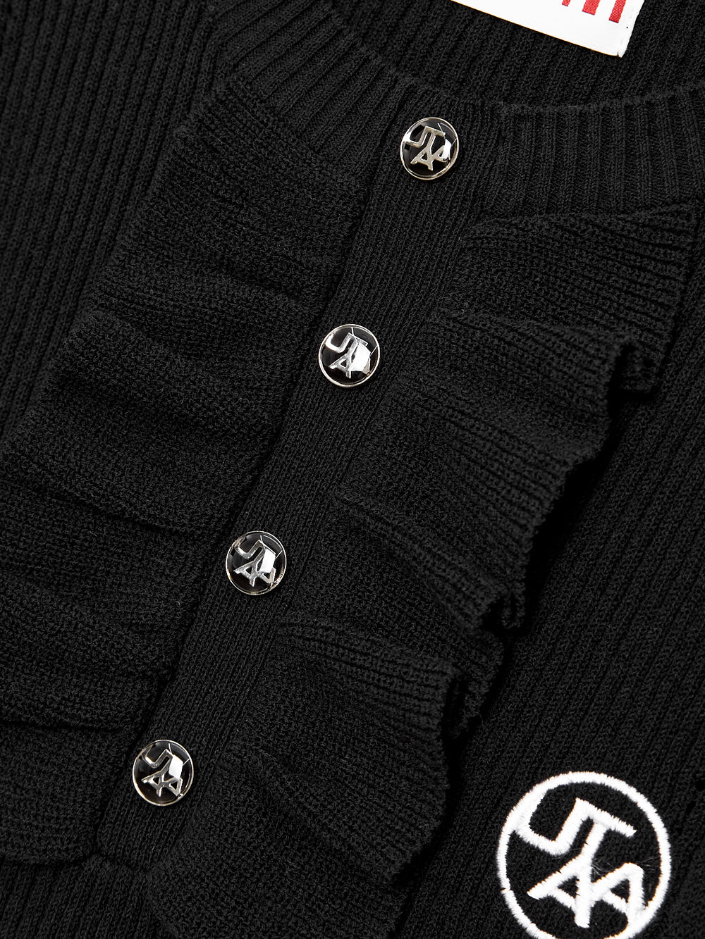 ラッフルレイヤーパンチングラインスリーブレスニット