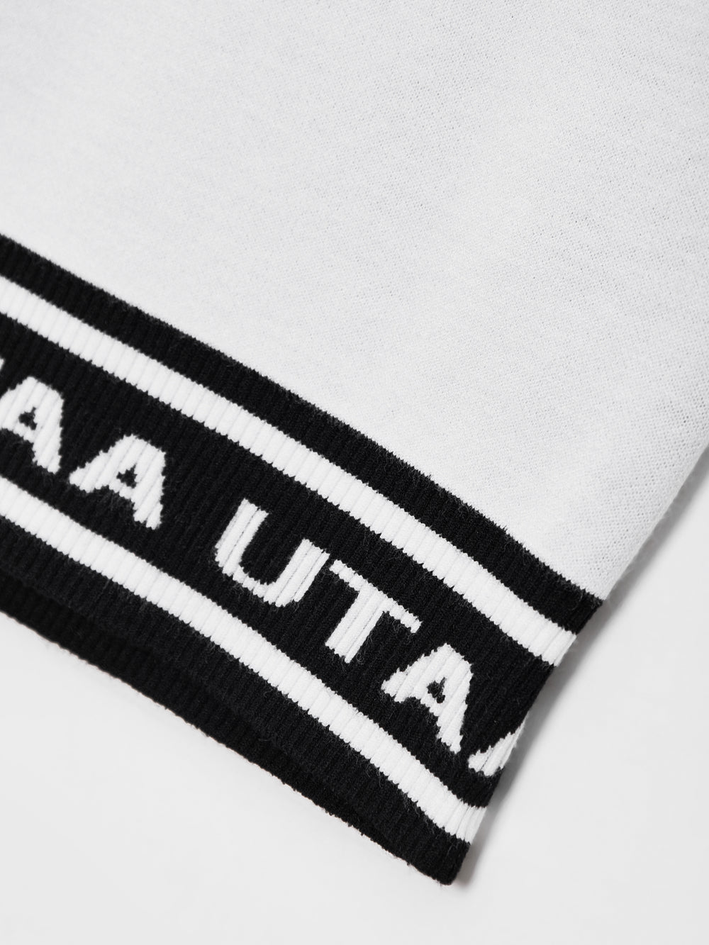 モノスローガンテープVネックニットベスト:メンズ