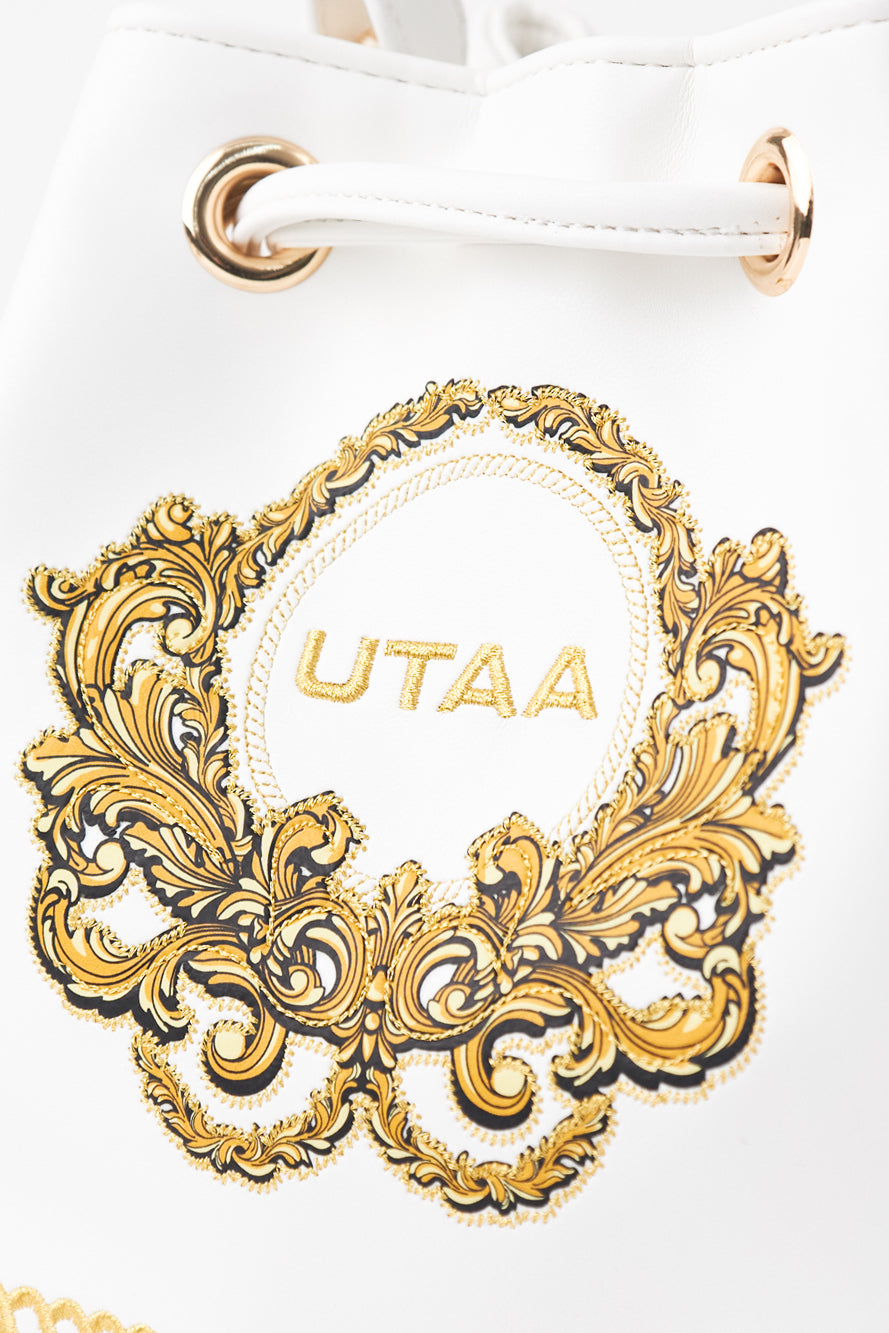 UTAA クレストゴールデンエンブレムバケットバッグ ホワイト : Women's