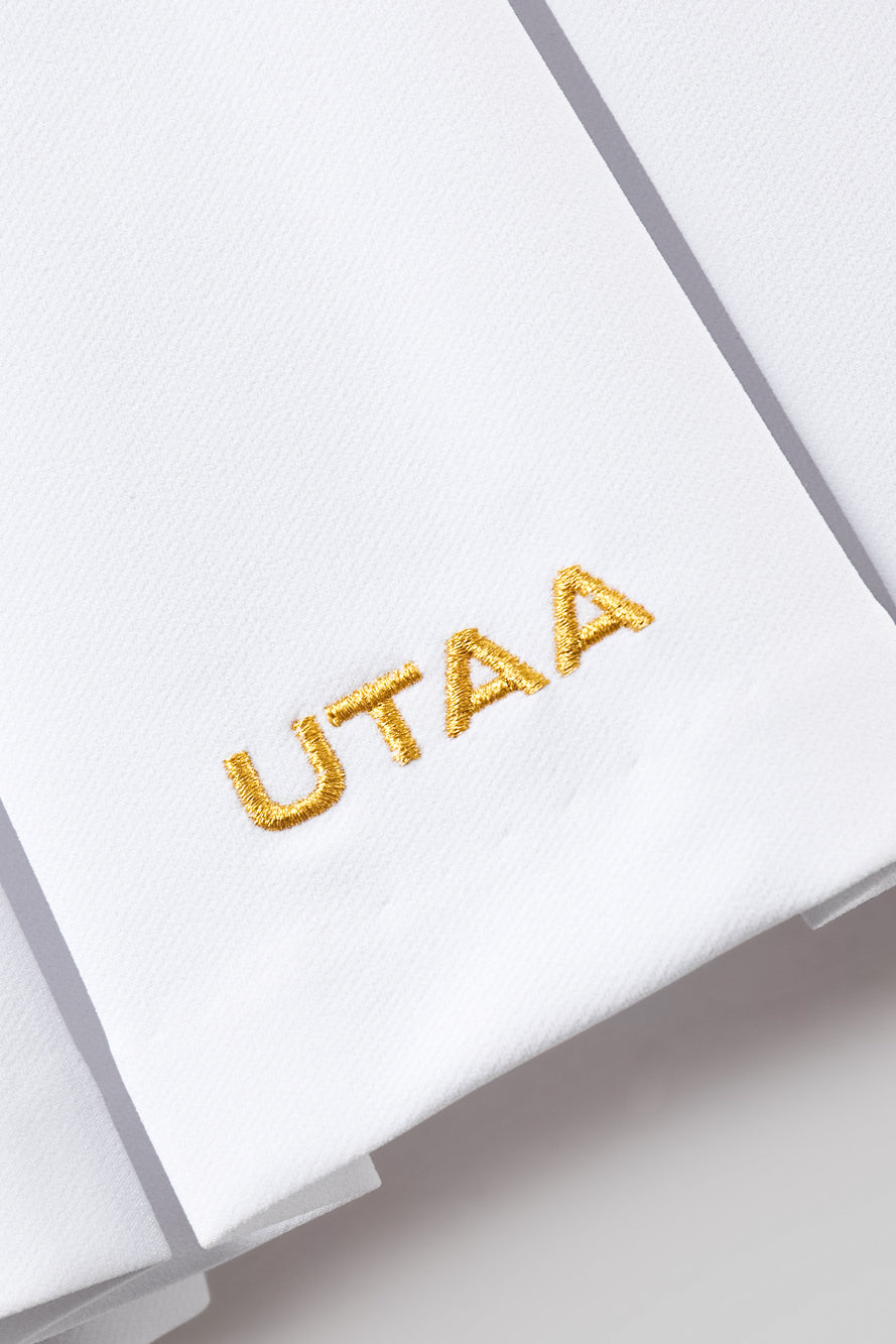 UTAA クレストゴールデンエンブレムポケットプリーツスカート ホワイト : Women's