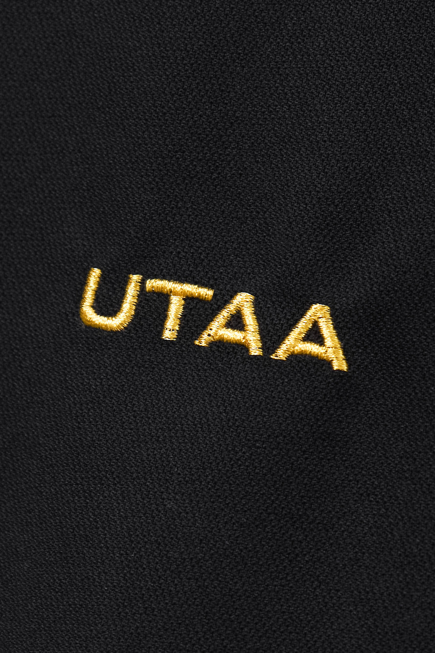 UTAA クレストゴールデンエンブレムPKTシャツ ブラック : Men's