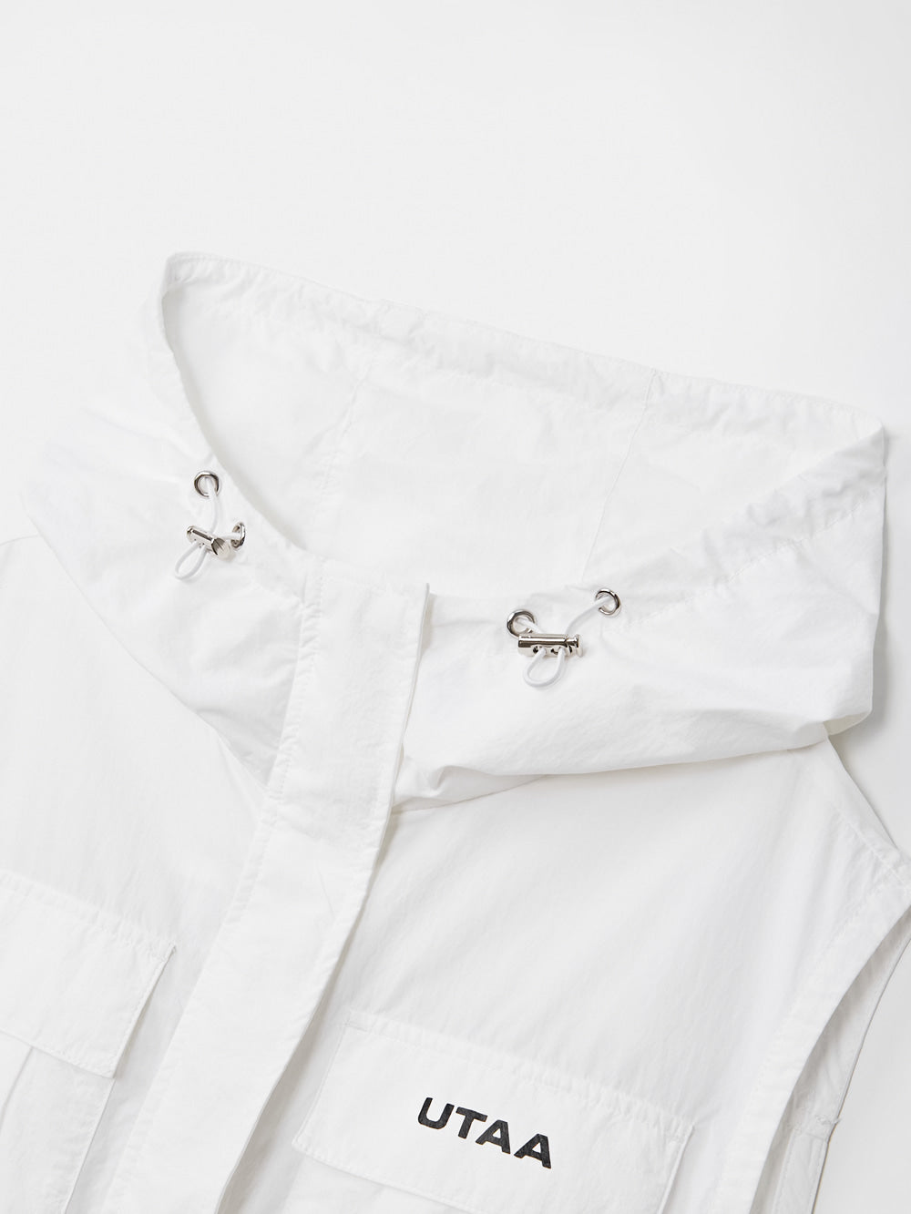 UTAA レタリングウインドブレーカーベストジャンパー ホワイト：レディース