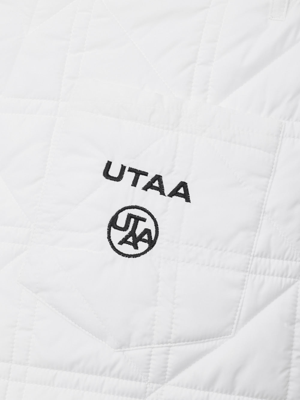 UTAA クロスキルティングシンボルパッド付きショートパンツ ホワイト：レディース