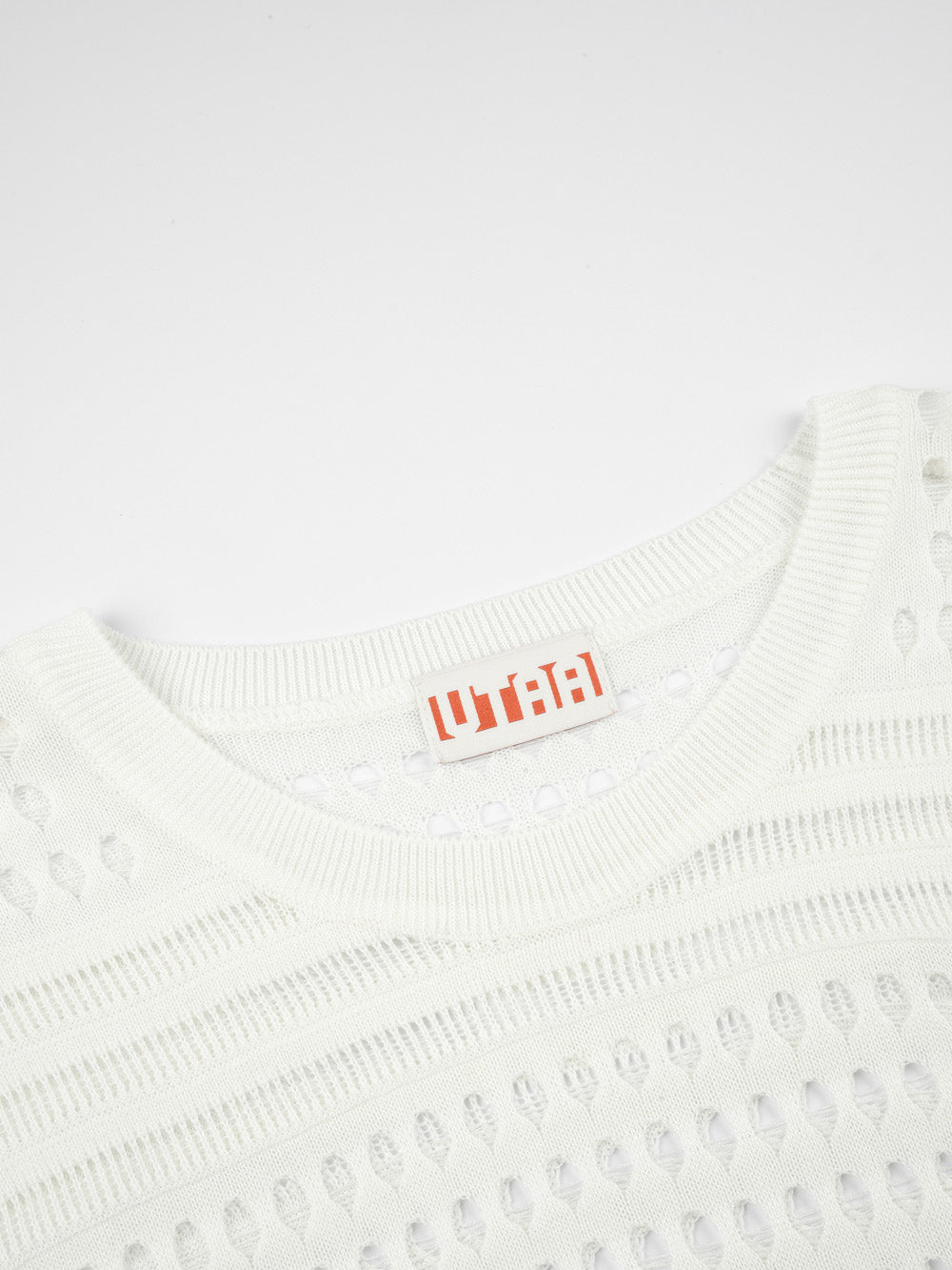 UTAA パンチングScasiニットベスト : Women's
