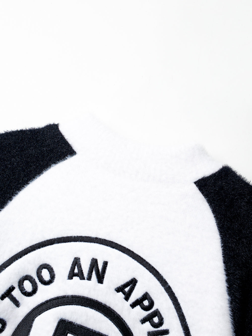 UTAA CircleエンブレムRaglanニットジャンパー : Women's
