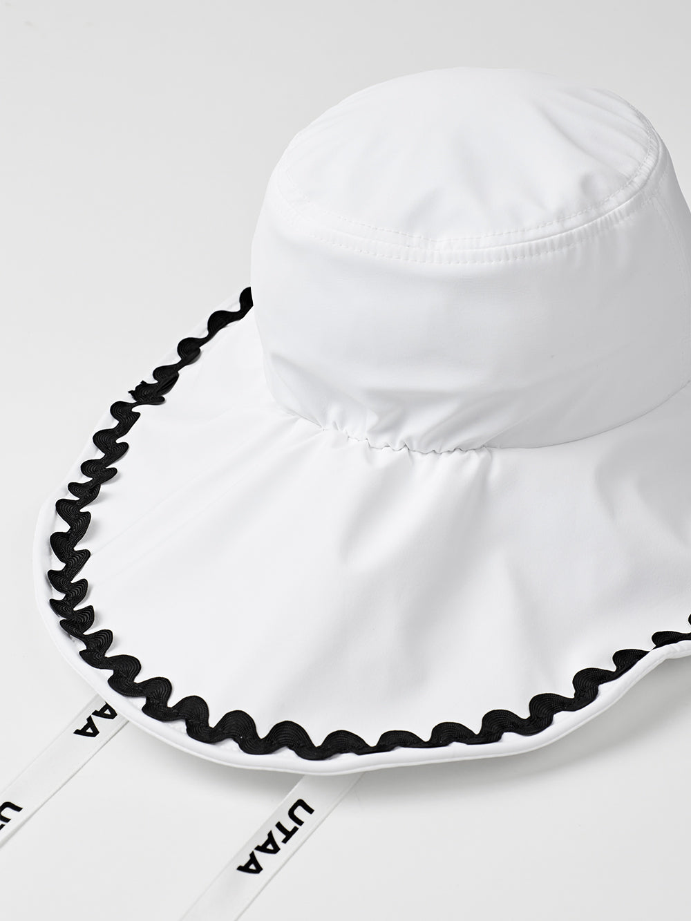 UTAA ティルダーウェーブレーンバケットハット : Women's