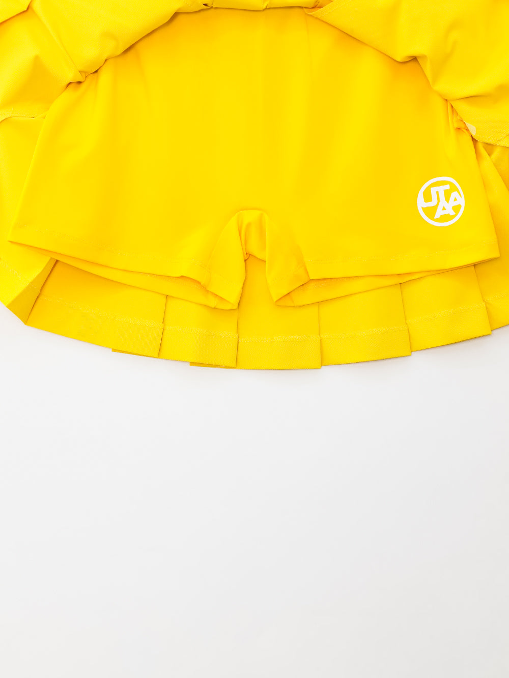 UTAA チャンピオンプリーツスカート イエロー : Women's