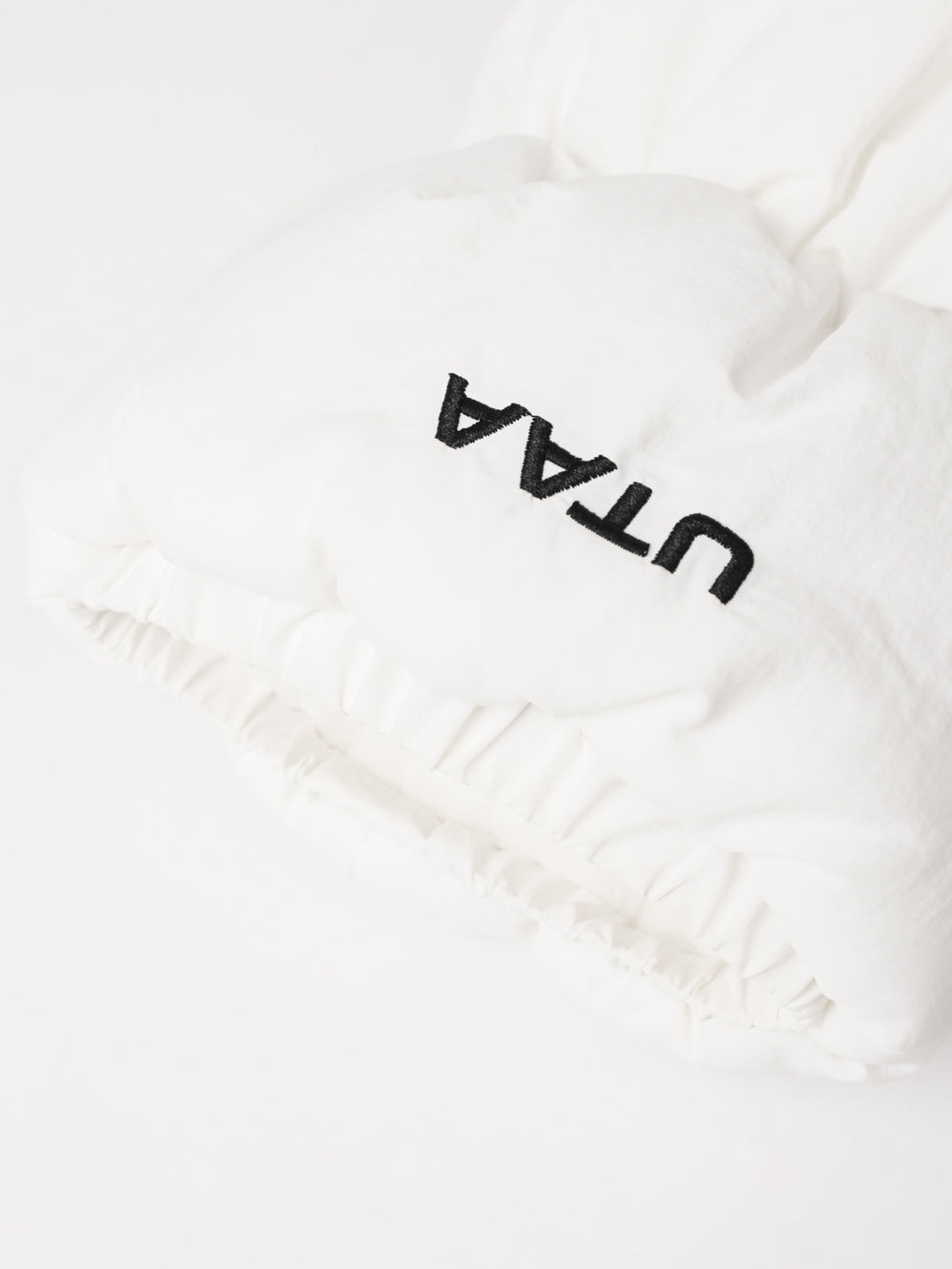 UTAA MinimalロゴブロックパディングLegWarmers ホワイト : Women's