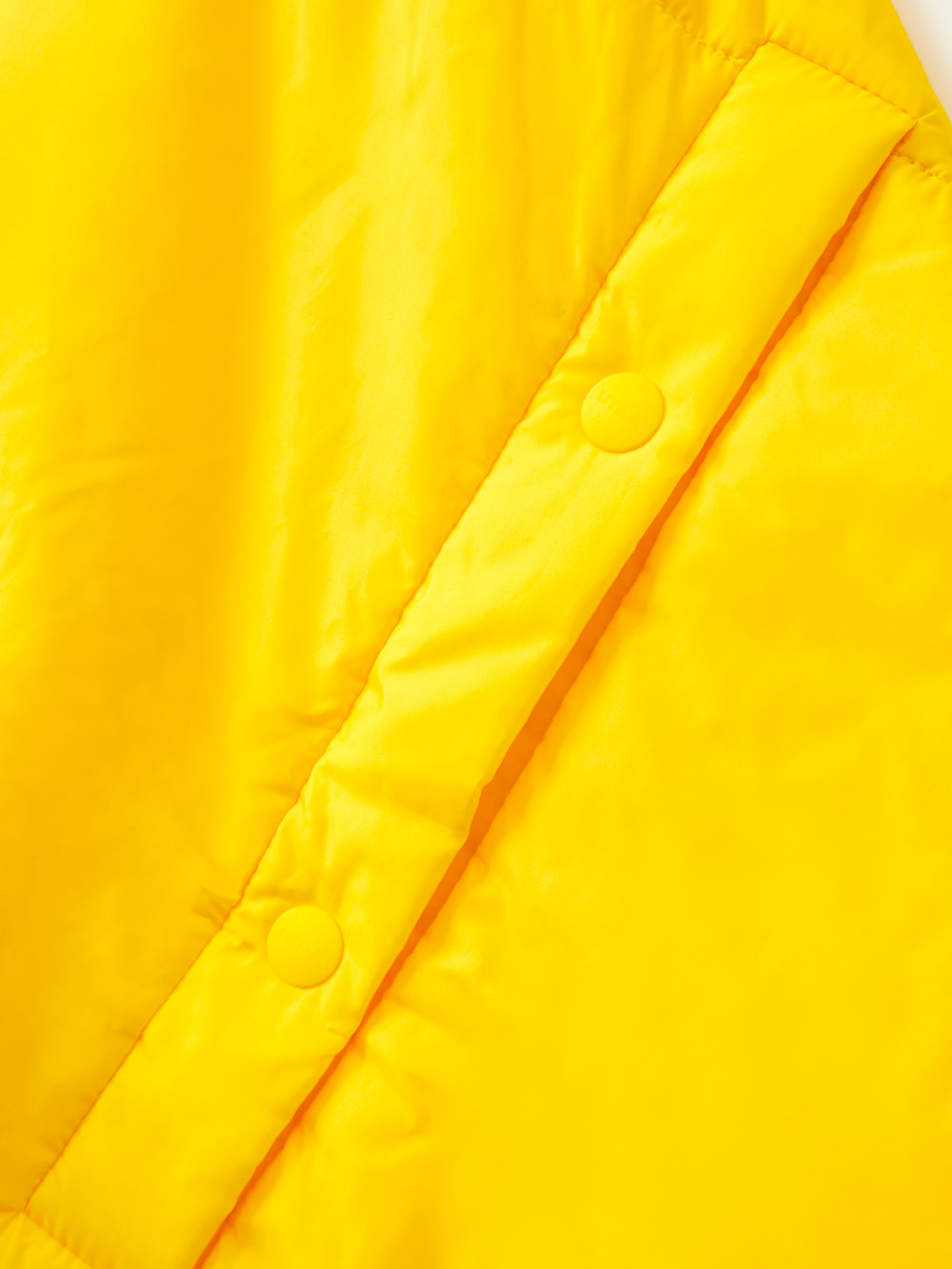 ビッグエンブレムパッディングショールケープ