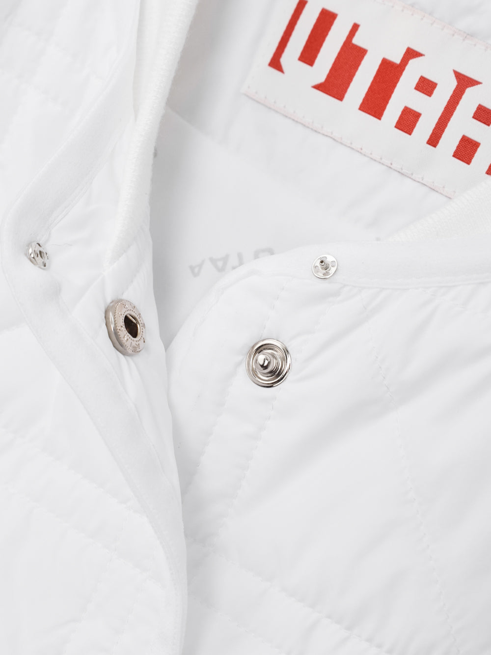 クロスキルティングエンブレムパディングジャンパー