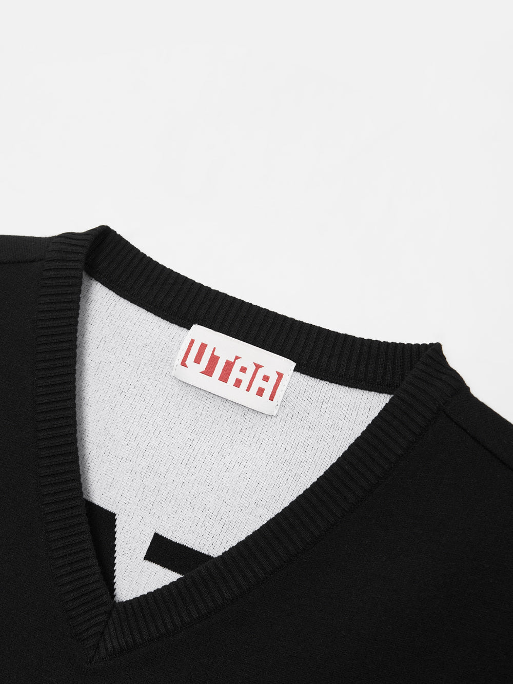 モノスローガンテープVネックニットベスト：レディース