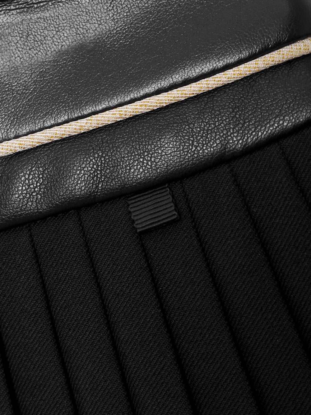 ロイヤルギルトトパーズ レザーミックスプリーツスカート : ブラック