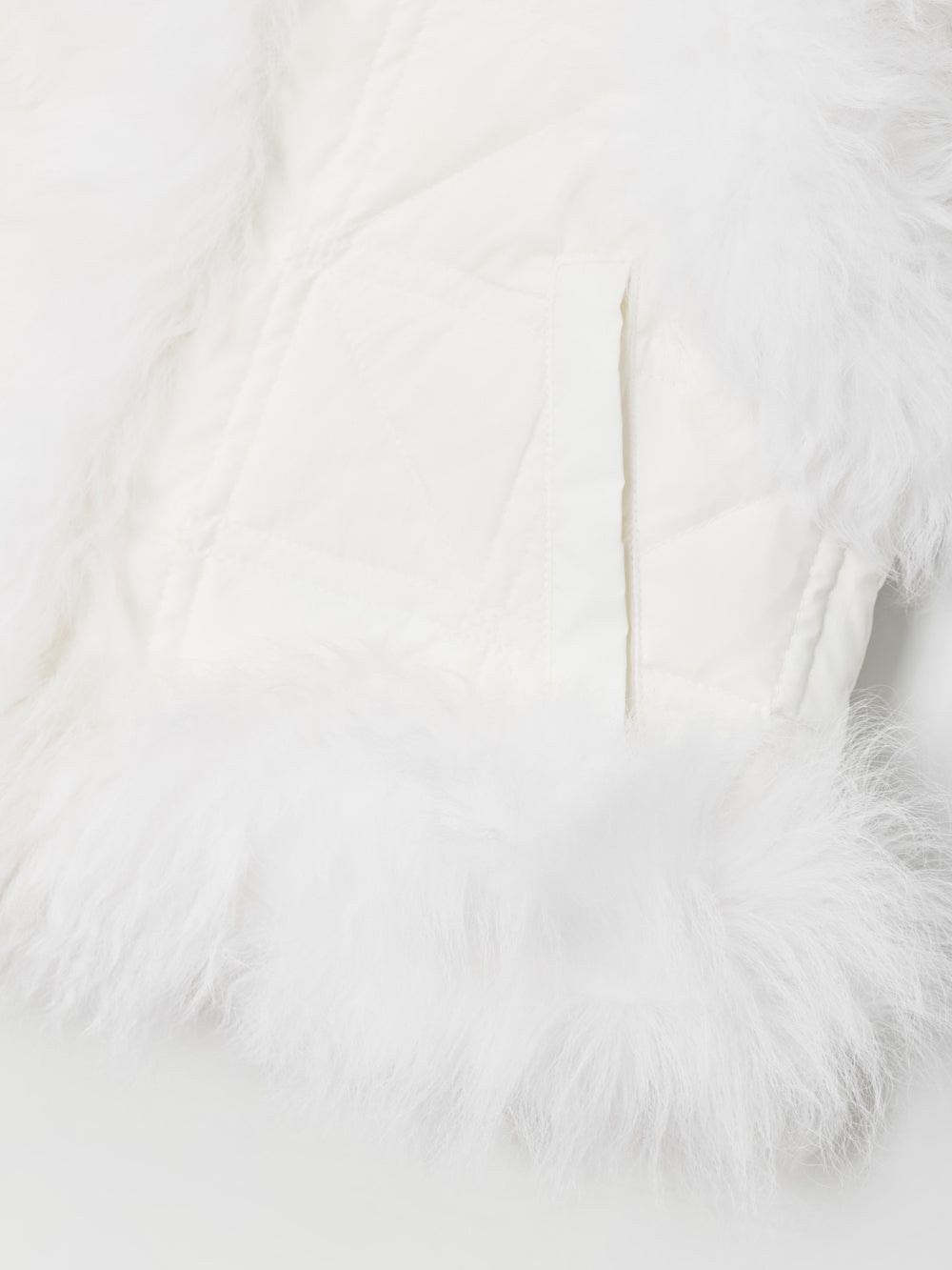 アングル キルト リバーシブル ファー ベスト