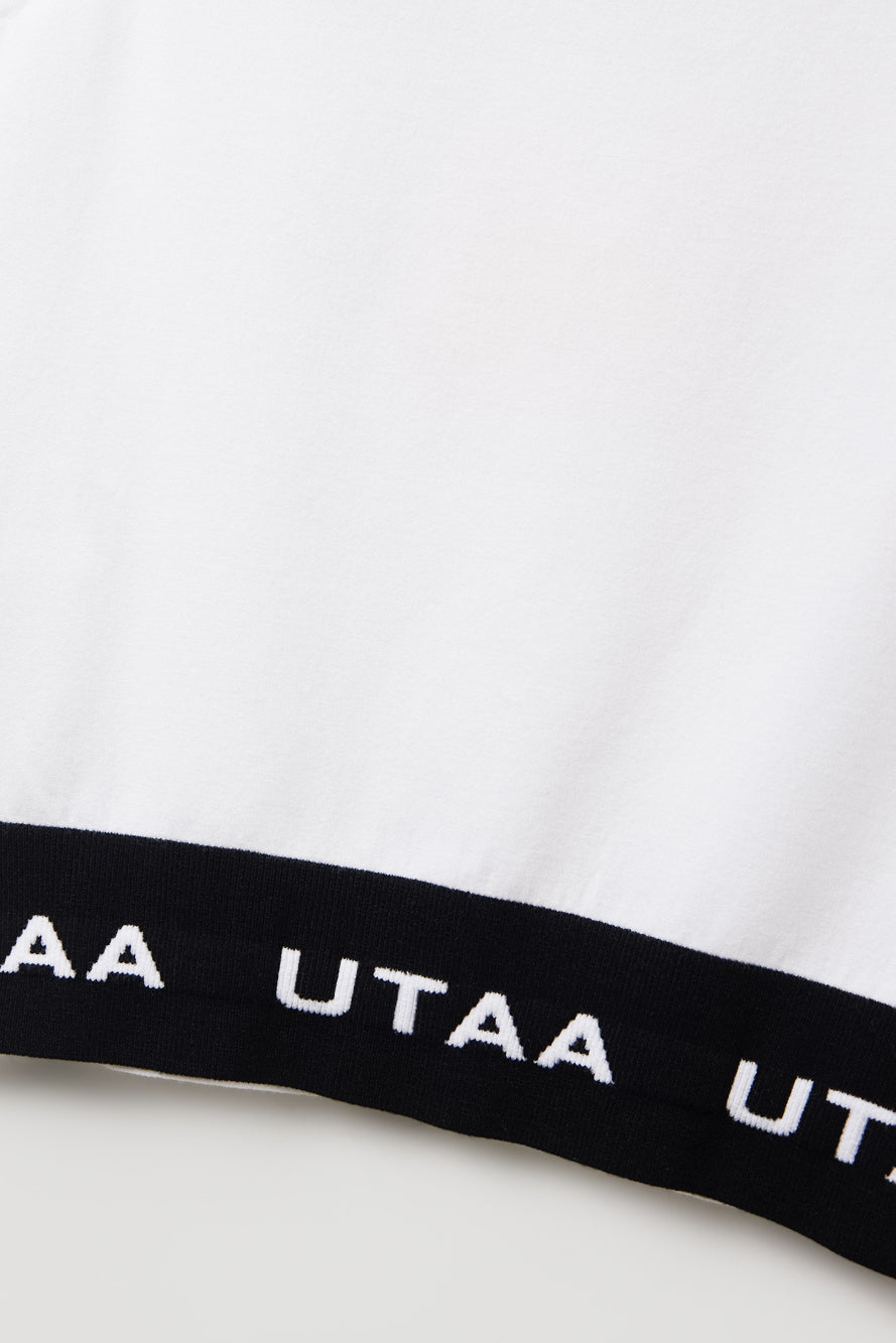 UTAA プルームカラースローガンVネックニットベスト ホワイト：レディース