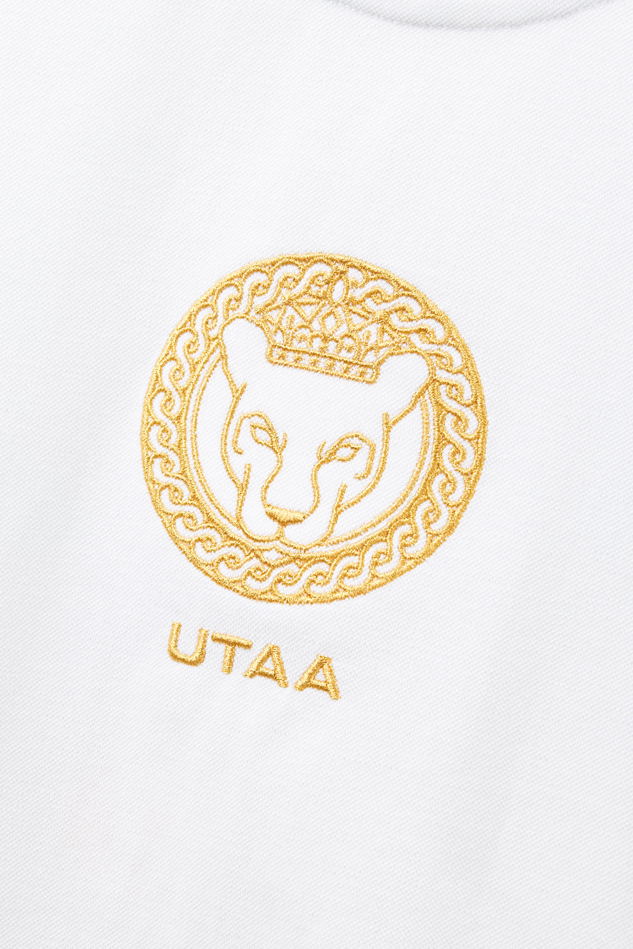 UTAA クレストゴールデンパンサータートルネックティー ホワイト : Women's