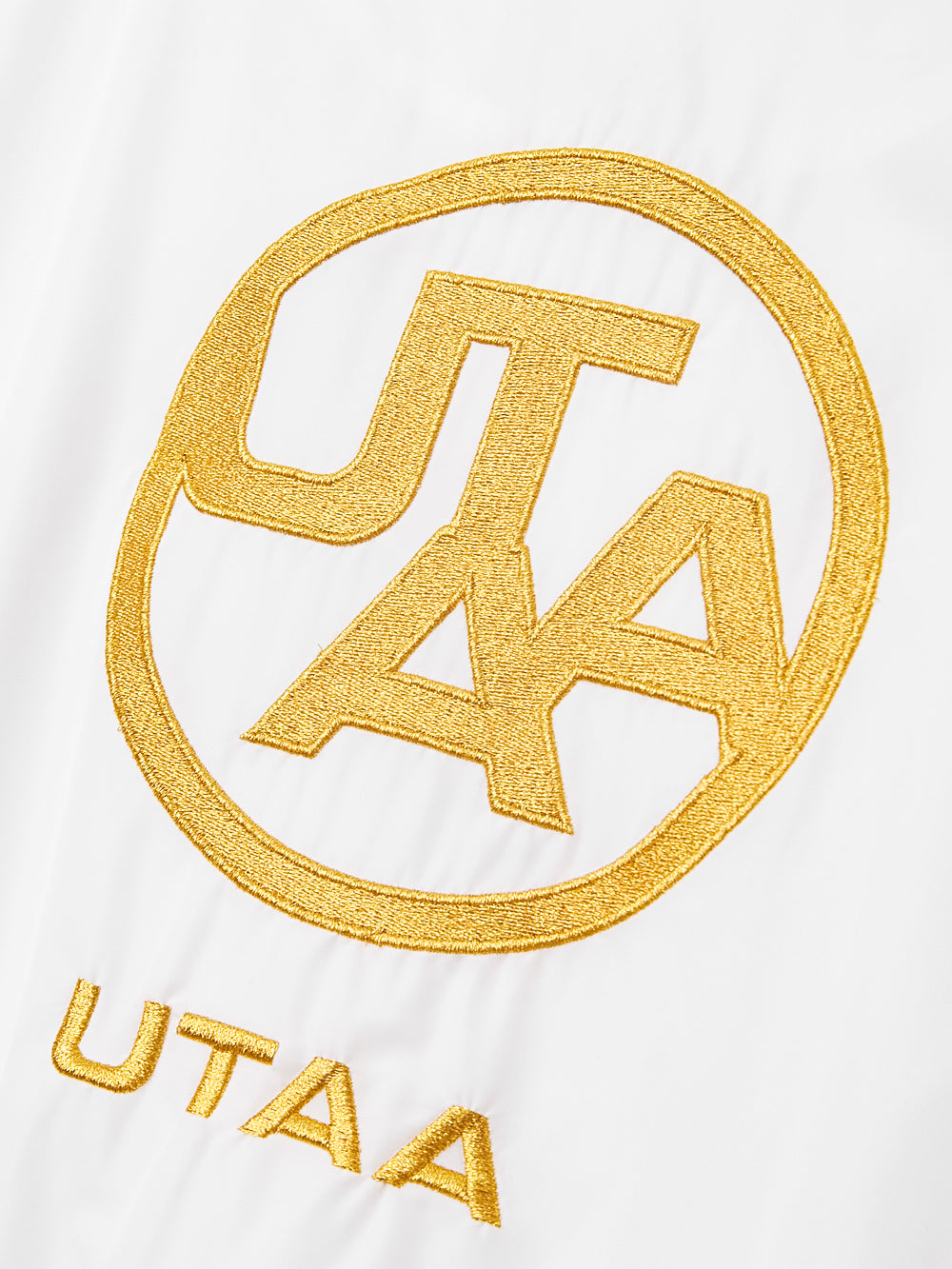 UTAA クラウンパンサーキングダムウインドブレーカージャンパー ホワイト：レディース