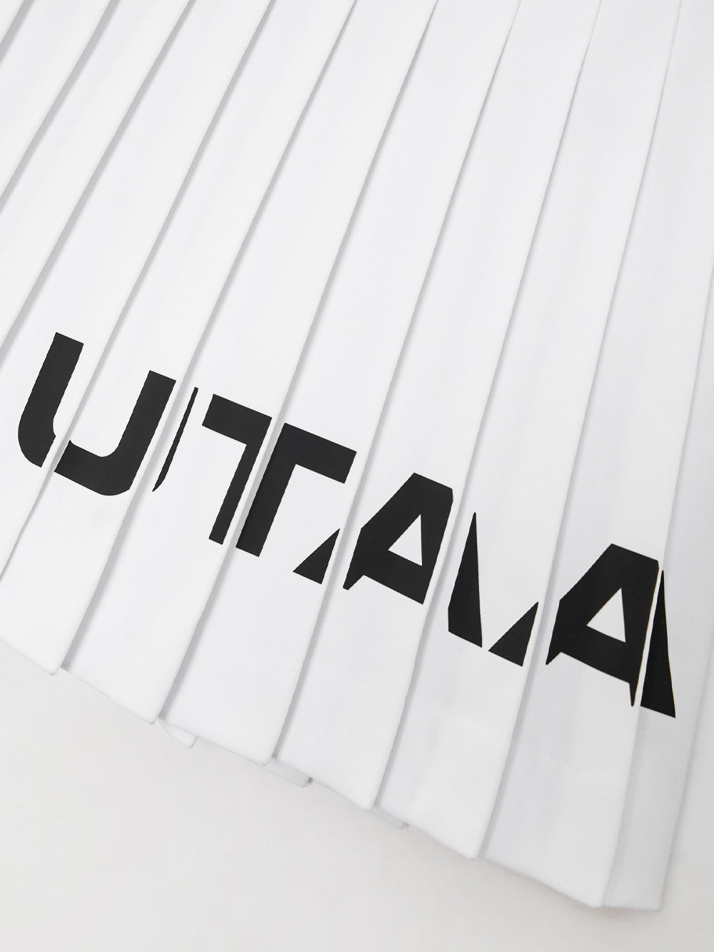 UTAA ニットミックスストレッチロゴプリーツスカート ホワイト